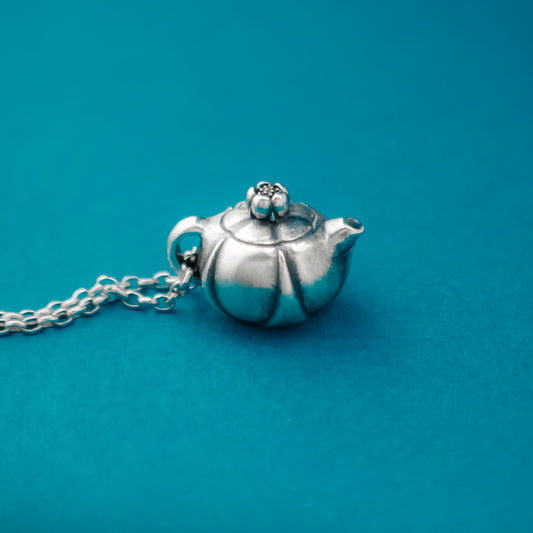 Plum Blossom Teapot Pendant